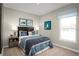 Charming bedroom features penguin-themed decor and a plush, inviting bed at 625 171St E St, Bradenton, FL 34212