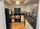 Well-equipped kitchen features modern appliances and ample counter space at 8150 Braddock Cir # 4, Port Richey, FL 34668