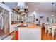 Spacious kitchen with stainless steel appliances, wood countertops, and ample cabinet space for modern living at 1031 Pomme De Pin Ln, New Port Richey, FL 34655