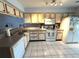 Functional kitchen with white cabinets and ample counter space at 11737 Spring Tree Ln, Port Richey, FL 34668