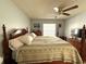 Spacious main bedroom with ceiling fan at 11737 Spring Tree Ln, Port Richey, FL 34668