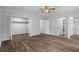 Spacious bedroom features dual closets with updated flooring and fan at 13289 Joy Path, Brooksville, FL 34601