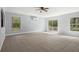 Spacious bonus room featuring tile flooring, ceiling fan and natural light at 13289 Joy Path, Brooksville, FL 34601