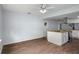 Bright kitchen featuring island with cooktop, granite counters, stainless appliances, and adjacent eating area at 13289 Joy Path, Brooksville, FL 34601