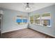 Bright living space with large windows, filling the room with natural light and views at 13289 Joy Path, Brooksville, FL 34601