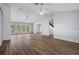 Open-concept living room with lots of natural light and views at 13289 Joy Path, Brooksville, FL 34601