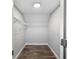 Cozy walk-in closet featuring wire shelving and a light at 13289 Joy Path, Brooksville, FL 34601