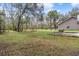 Scenic expansive yard with trees, and a lush lawn at 13289 Joy Path, Brooksville, FL 34601