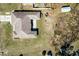 Aerial view of the property showcasing the backyard, outbuildings, and layout at 13419 Banner Rd, Spring Hill, FL 34609