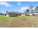 Expansive backyard featuring a well-maintained lawn and space for recreation at 13419 Banner Rd, Spring Hill, FL 34609