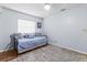 Bright bedroom with a neutral color scheme, natural light, and area rug at 13419 Banner Rd, Spring Hill, FL 34609