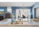 Kitchen featuring a large sink, granite countertops, and bay window in the dining area at 13419 Banner Rd, Spring Hill, FL 34609