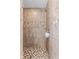 Tiled shower with a shower head and tiled flooring at 13419 Banner Rd, Spring Hill, FL 34609