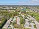 An elevated view of the home in a golf community, near a lake and golf course at Heritage Pines at 18325 Whitacre Cir, Hudson, FL 34667