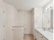 Bathroom featuring tiled floors, a single vanity, and a toilet nook at 18325 Whitacre Cir, Hudson, FL 34667