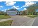 Charming single-story home with a two-car garage, brick paver driveway and well-manicured lawn at 19770 Tattnall Way, Brooksville, FL 34601