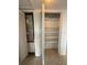 View of a closet with storage shelves and an HVAC system on one side at 301 Longwood Dr, Brooksville, FL 34601