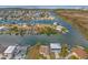 Beautiful aerial view of waterfront homes situated on canals, offering serene water views at 3403 Holly Springs Dr, Hernando Beach, FL 34607
