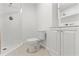 Clean bathroom featuring a stand-up shower, tile flooring, and a modern vanity at 3403 Holly Springs Dr, Hernando Beach, FL 34607