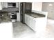 Updated kitchen with stainless steel appliances and light countertops at 3403 Holly Springs Dr, Hernando Beach, FL 34607