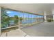 Screened-in patio with serene waterfront views, perfect for relaxation at 3403 Holly Springs Dr, Hernando Beach, FL 34607