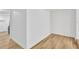 Bright empty room with modern wood floors and clean white walls at 4148 Fairfield S Ave, St Petersburg, FL 33711