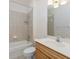 Bathroom with a shower, bath tub, vanity, and mirror at 4412 Caliquen Dr, Brooksville, FL 34604