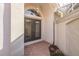 Inviting front entrance featuring double doors, brick pavers, and a charming arched transom window at 4412 Caliquen Dr, Brooksville, FL 34604