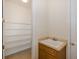 Spacious pantry with wire shelving and a utility sink at 4412 Caliquen Dr, Brooksville, FL 34604