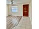 Living room featuring wood floors and tile entry way at 4912 Getner St, New Port Richey, FL 34652