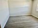 Bedroom featuring hardwood flooring and light gray walls at 4930 Getner St, New Port Richey, FL 34652