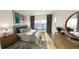 Well-lit main bedroom with a large window and neutral decor at 5015 Us Highway 19 # 208, New Port Richey, FL 34652