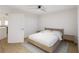 Bright bedroom with a bed, closet and nightstands in a minimalist design at 5015 Us Highway 19 # 408, New Port Richey, FL 34652