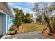 Well-maintained backyard features a lush lawn and landscaping, perfect for outdoor activities and relaxation at 5830 34Th N Ave, St Petersburg, FL 33710