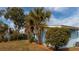 Charming home exterior with mature trees, well-manicured landscaping, and inviting curb appeal at 5830 34Th N Ave, St Petersburg, FL 33710