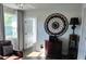 Cozy room featuring a large window, wood furniture, and modern decorative elements at 5830 34Th N Ave, St Petersburg, FL 33710
