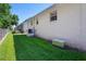 Backyard featuring a well-maintained lawn and privacy fence at 6028 Wilds Dr # 6A, New Port Richey, FL 34653