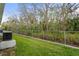 Backyard featuring a well-maintained lawn and privacy fence at 6028 Wilds Dr # 6A, New Port Richey, FL 34653