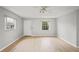 Bright room with modern flooring and ample natural light at 6028 Wilds Dr # 6A, New Port Richey, FL 34653