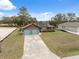 Inviting single-Gathering home with a two-car garage, solar panels, and a spacious driveway at 6442 Melacano Ave, Spring Hill, FL 34608