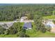 A home in a wooded community with new construction nearby, aerial view at 6452 Summit View Dr, Brooksville, FL 34601