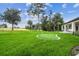 Backyard with putting green and golf course view at 6452 Summit View Dr, Brooksville, FL 34601