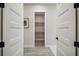 Hallway and doorway leading into a walk-in closet at 6452 Summit View Dr, Brooksville, FL 34601