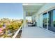 This balcony offers stunning waterfront views with comfortable outdoor seating to watch the boats go by at 6613 Josie Ln, Hudson, FL 34667
