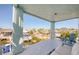 Balcony view overlooking the water with seating and neighborhood views at 6613 Josie Ln, Hudson, FL 34667