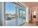 Balcony with views of the water and nearby houses at 6613 Josie Ln, Hudson, FL 34667