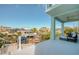 Enjoy the waterfront views from this breezy balcony, featuring a ceiling fan and outdoor seating with views of the boats at 6613 Josie Ln, Hudson, FL 34667