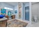 Modern bathroom featuring a double vanity, a separate makeup area, and a walk-in shower at 6613 Josie Ln, Hudson, FL 34667