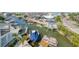 Scenic canal view featuring boats docked near waterfront homes, captured from a high vantage point at 6613 Josie Ln, Hudson, FL 34667