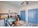 Home office with plenty of storage, a view of a blue closet, and a computer at 6613 Josie Ln, Hudson, FL 34667